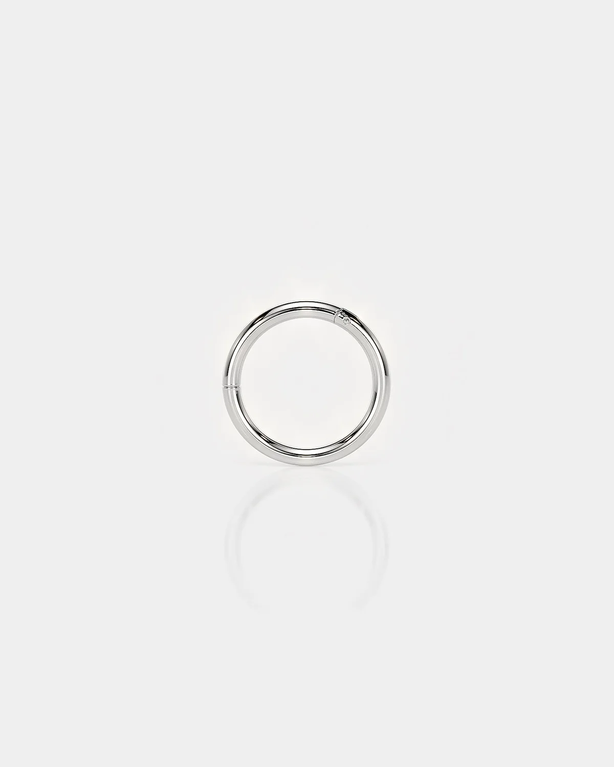Polished silver titanium hinged piercing ring